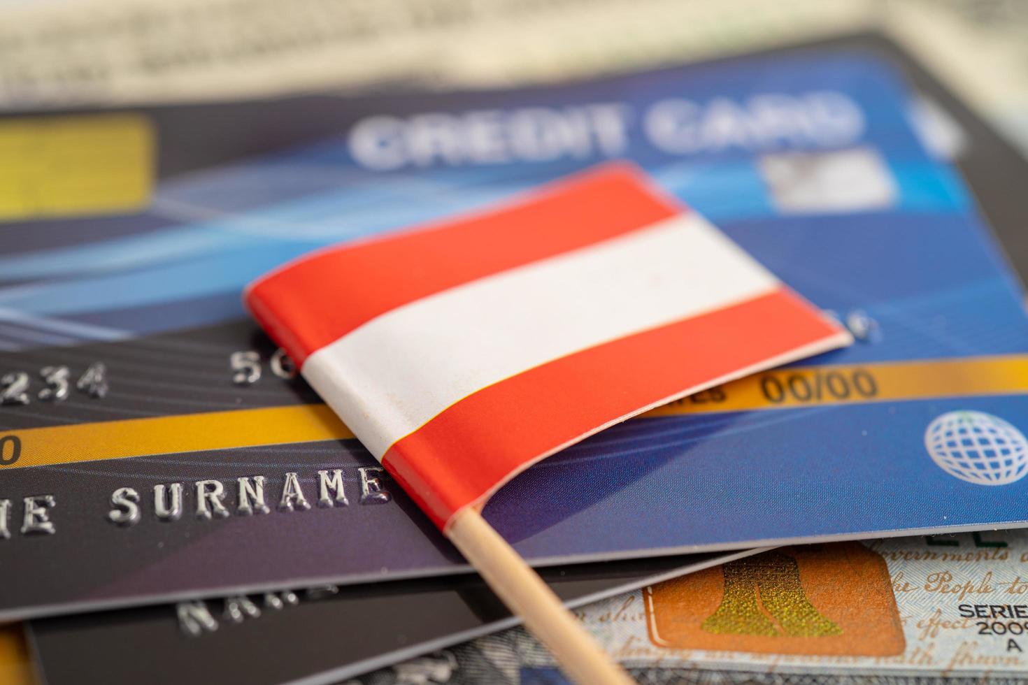 Austria flag on credit card. Finance development, Banking Account, Statistics, Investment Analytic research data economy, Stock exchange trading, Business company concept. photo