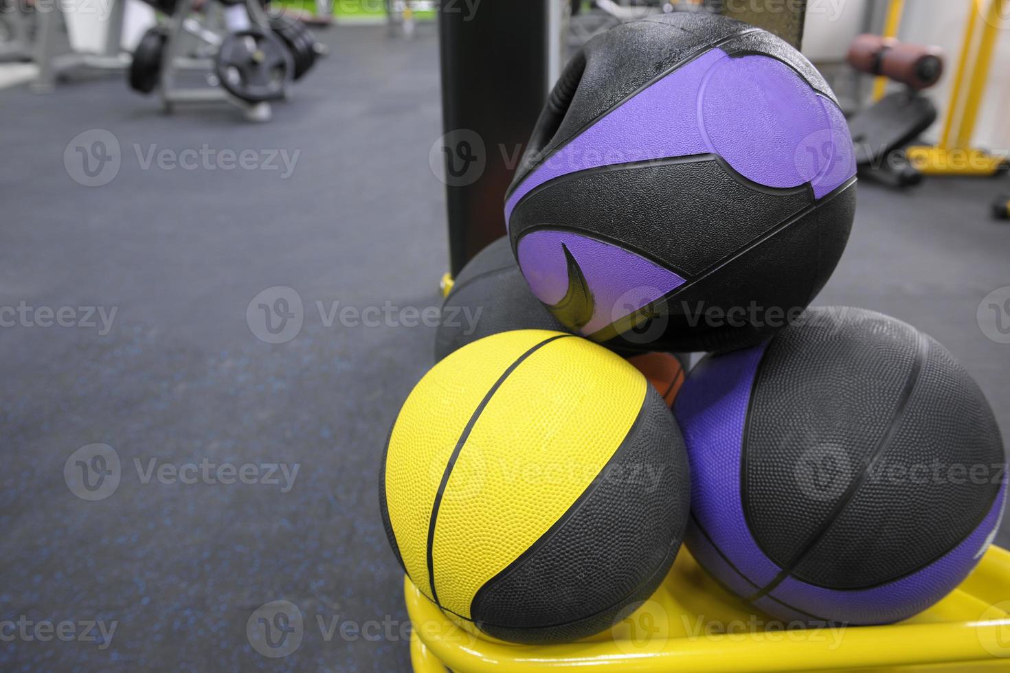 closeup of round dumbbells in the gym photo