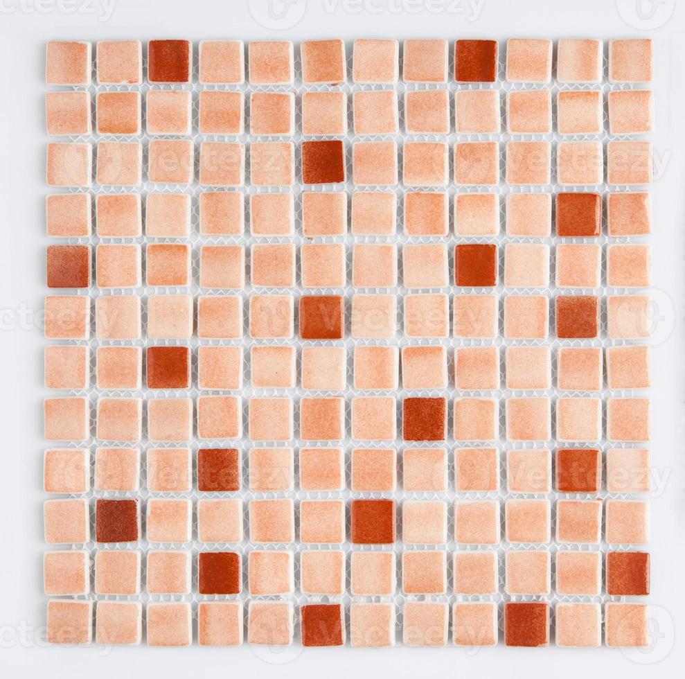 little brown ceramic tile on a white background, top view, majolica. for the catalog photo