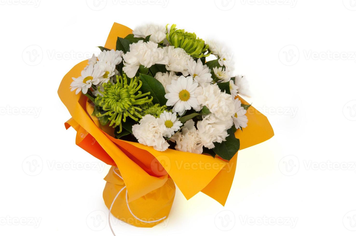 white chamomile and carnation in a paper bouquet tied ribbon on a white background. Valentine's Day photo