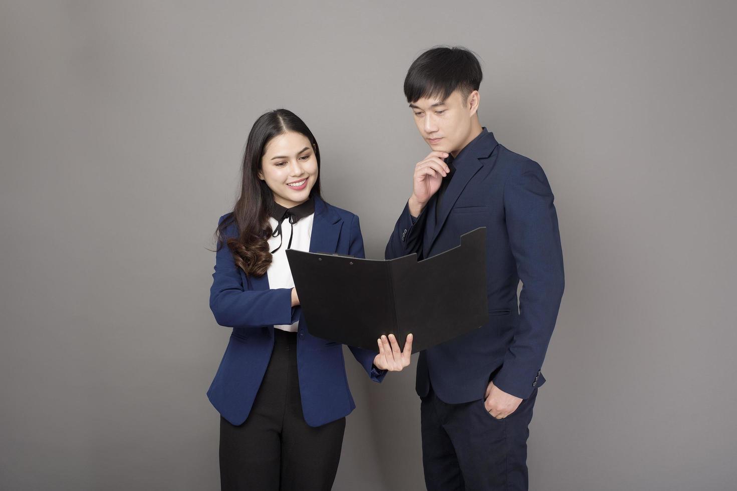 portrait of businessman and professional consultant business woman in studio photo