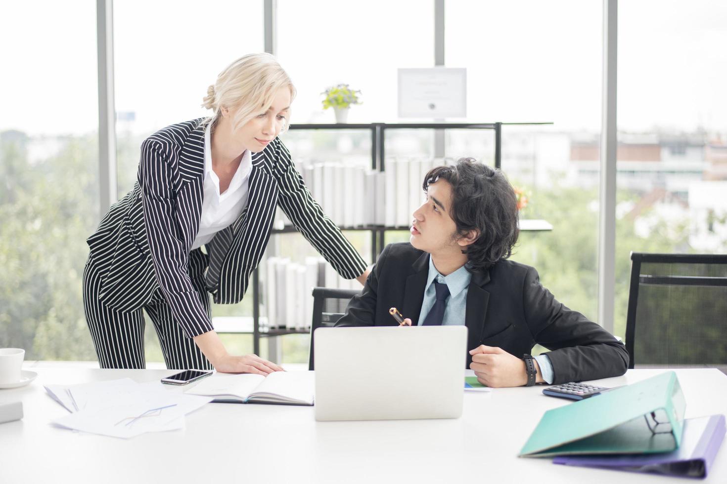 Business people are analyzing financial report photo