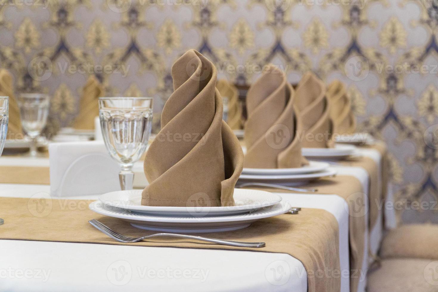 serving banquet table in a luxurious restaurant in beige and white style photo