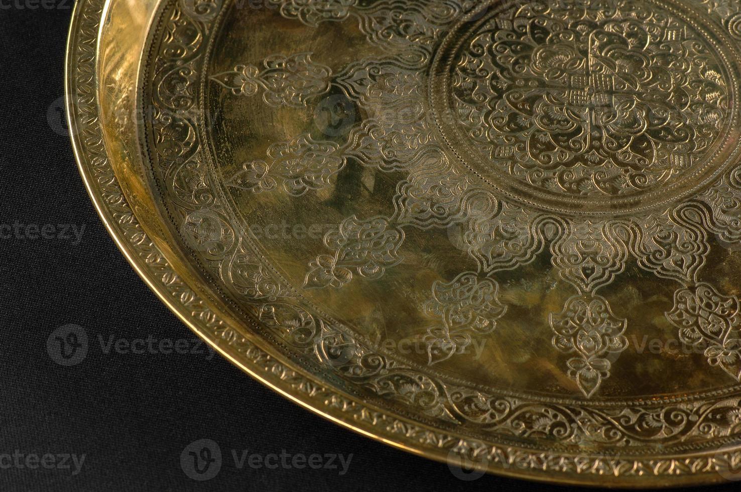 closeup of the tray with Eastern engraving photo