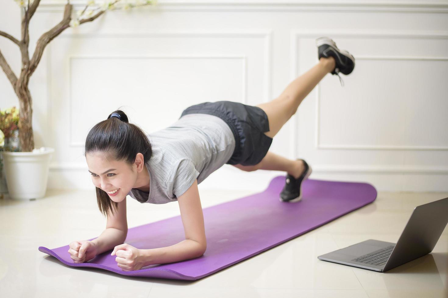 fitness woman exercise in home photo