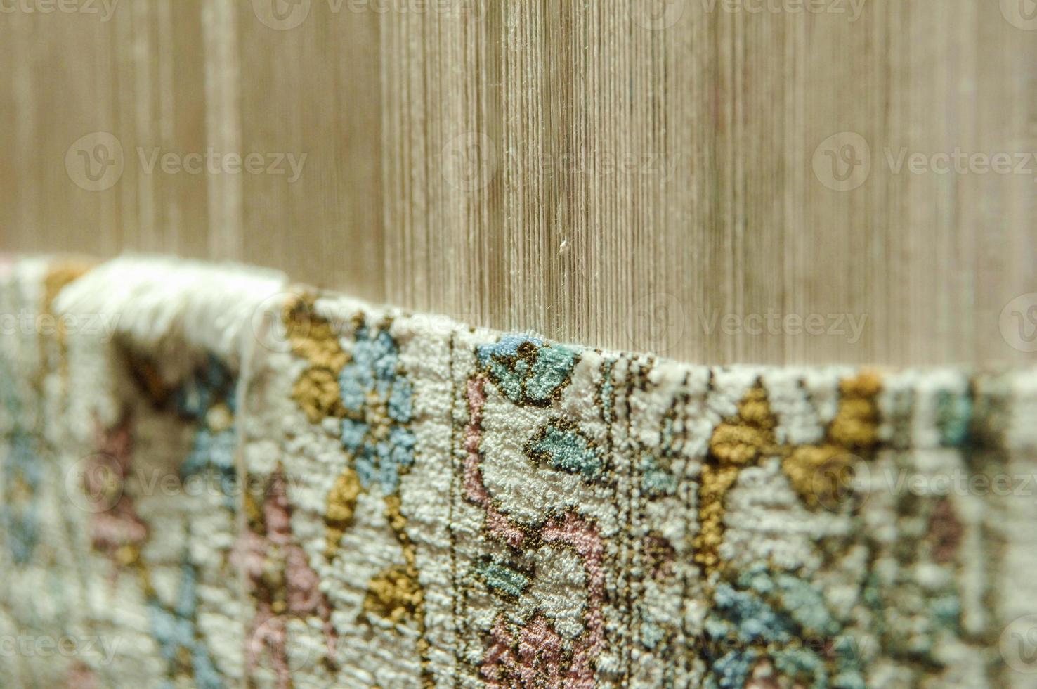 Weaving and manufacturing of handmade carpets. Carpet in the making