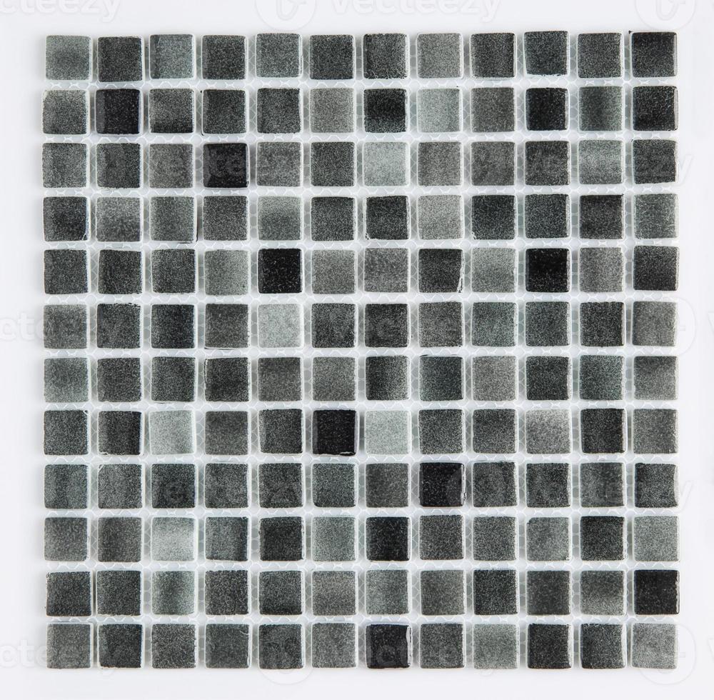 little black ceramic tile on a white background, top view, majolica. for the catalog photo