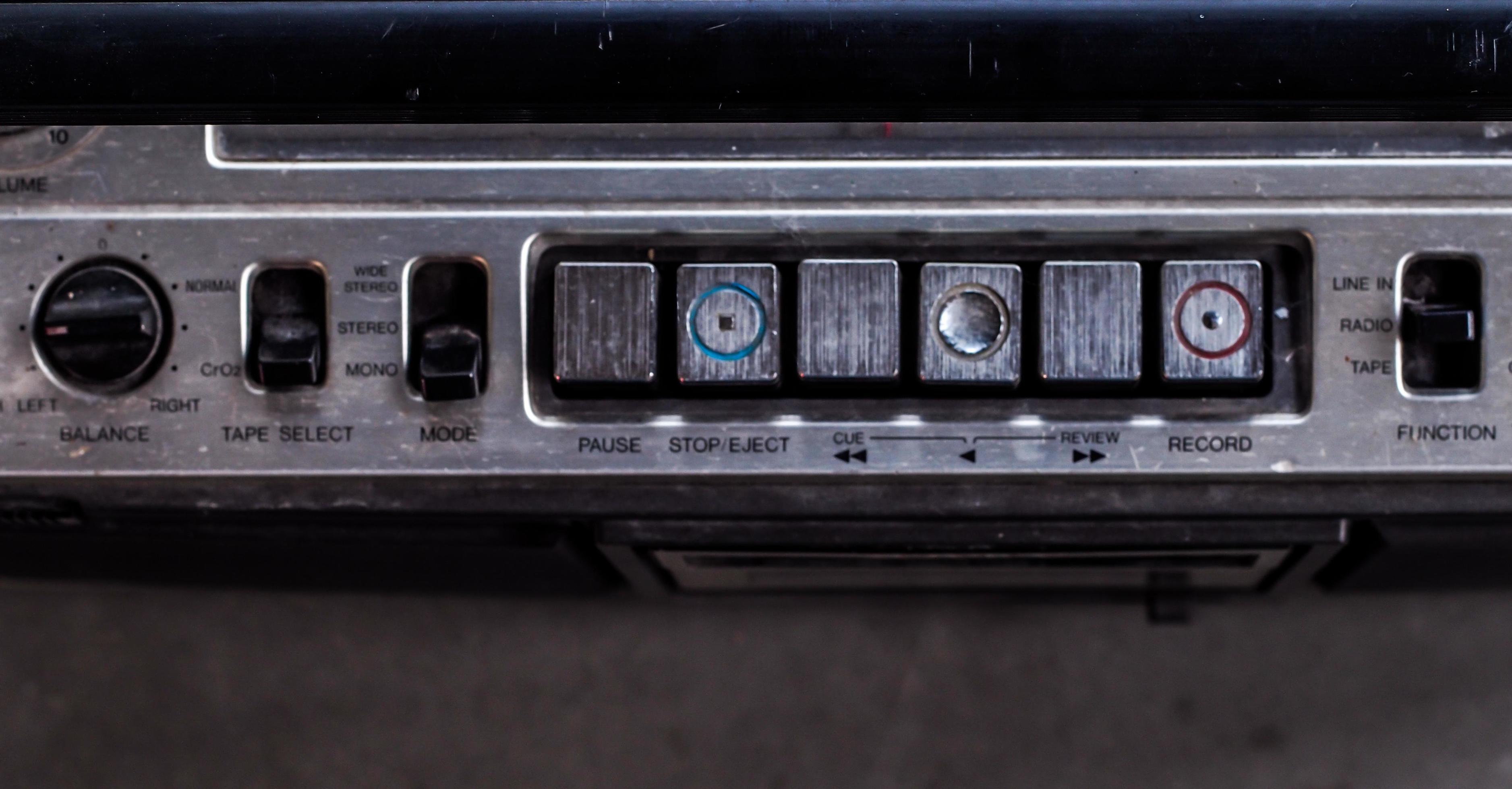 Old vintage technology cassette record and radio player buttons