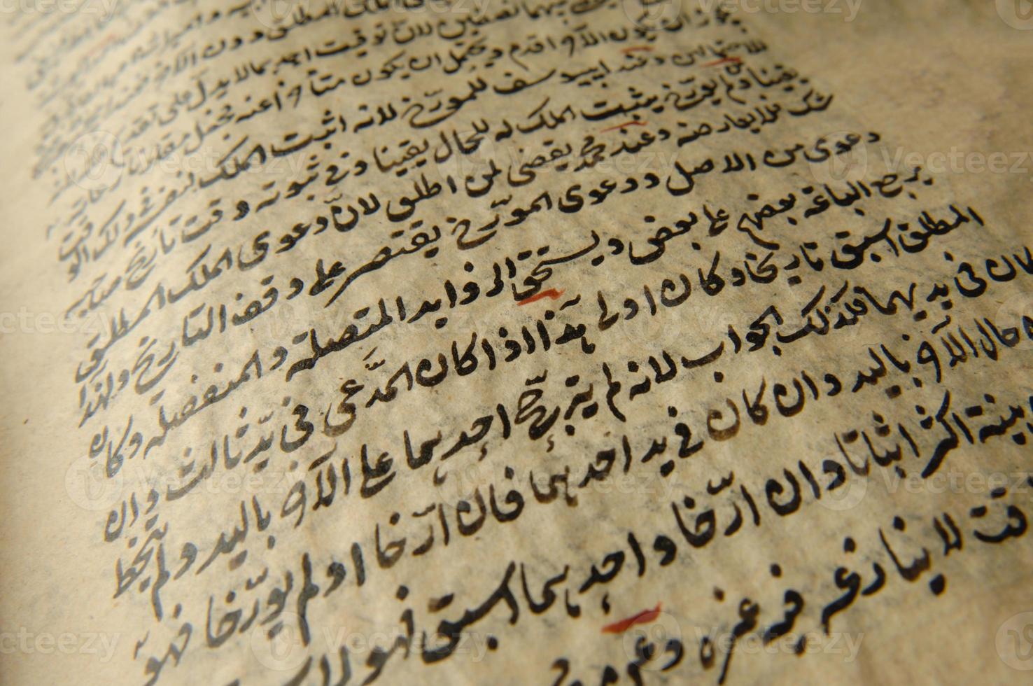 Ancient open book in arabic. Old arabic manuscripts and texts photo