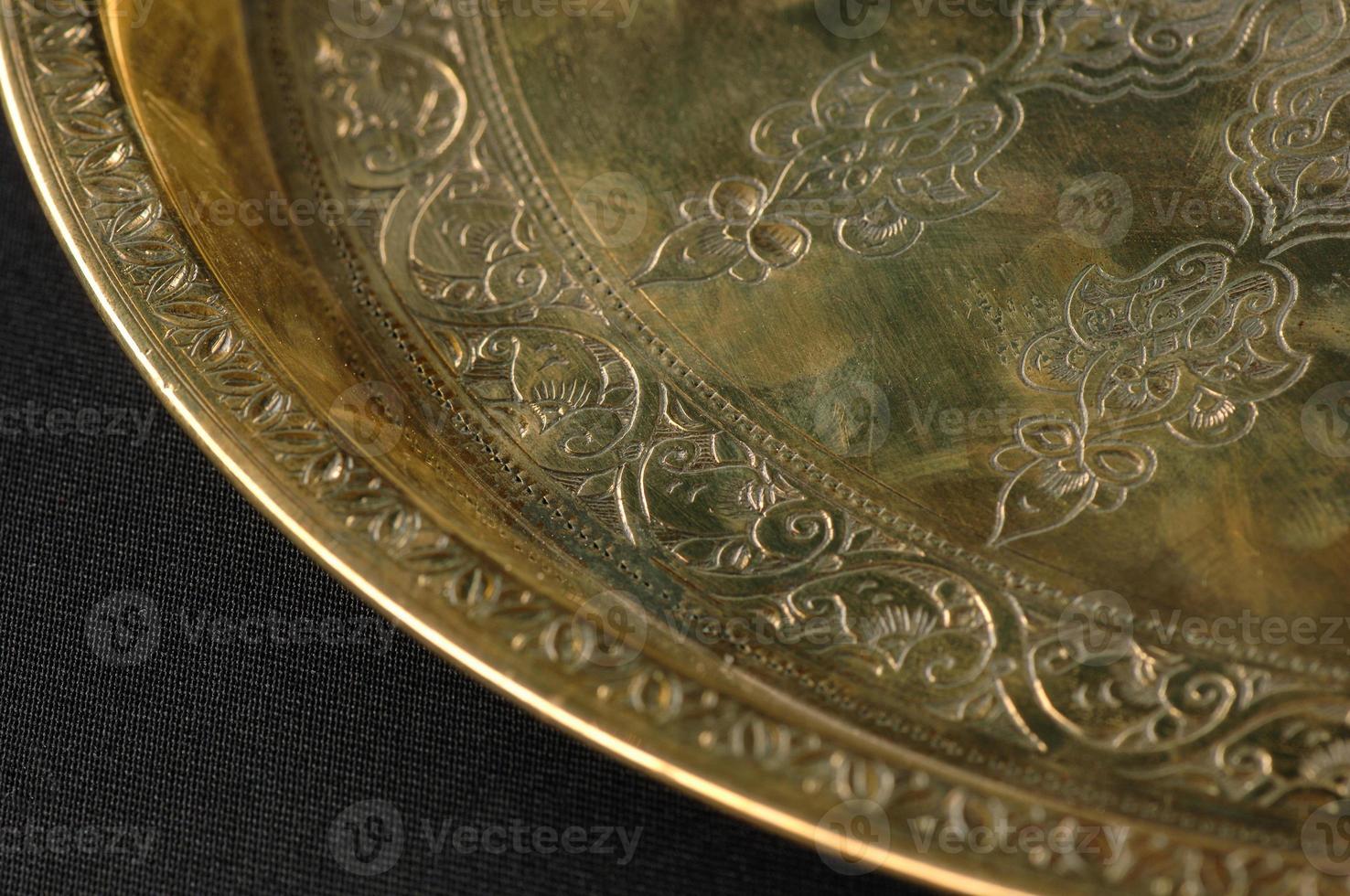 closeup of the tray with Eastern engraving photo