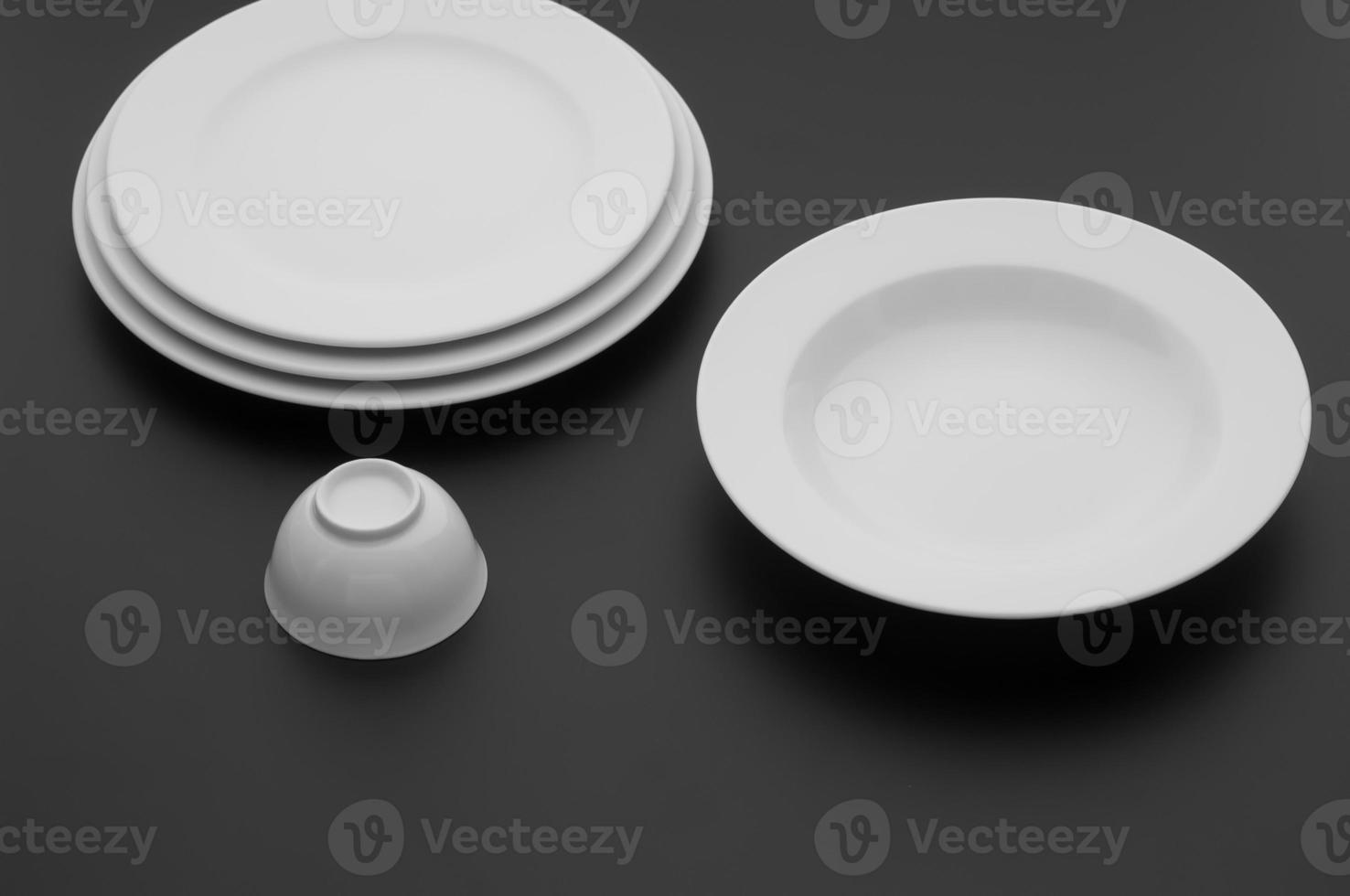 kitchen and restaurant utensils, plates, on a dark background photo