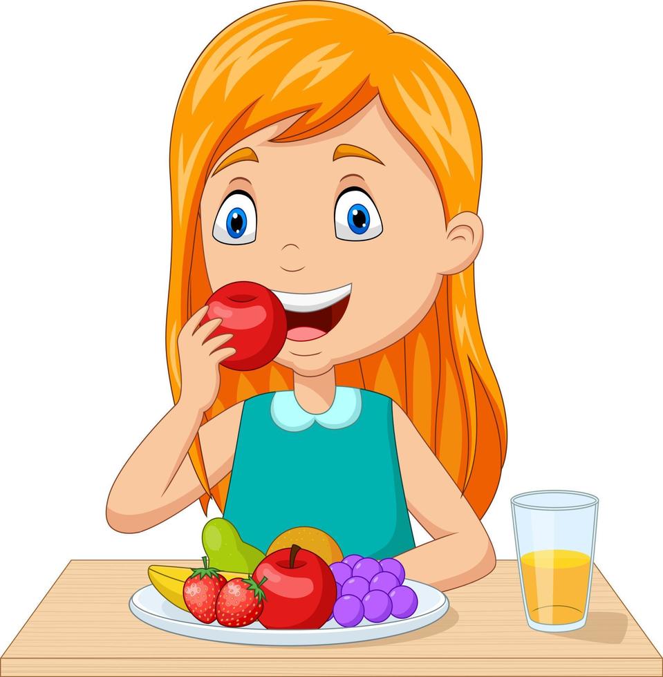 niña comiendo frutas en la mesa vector