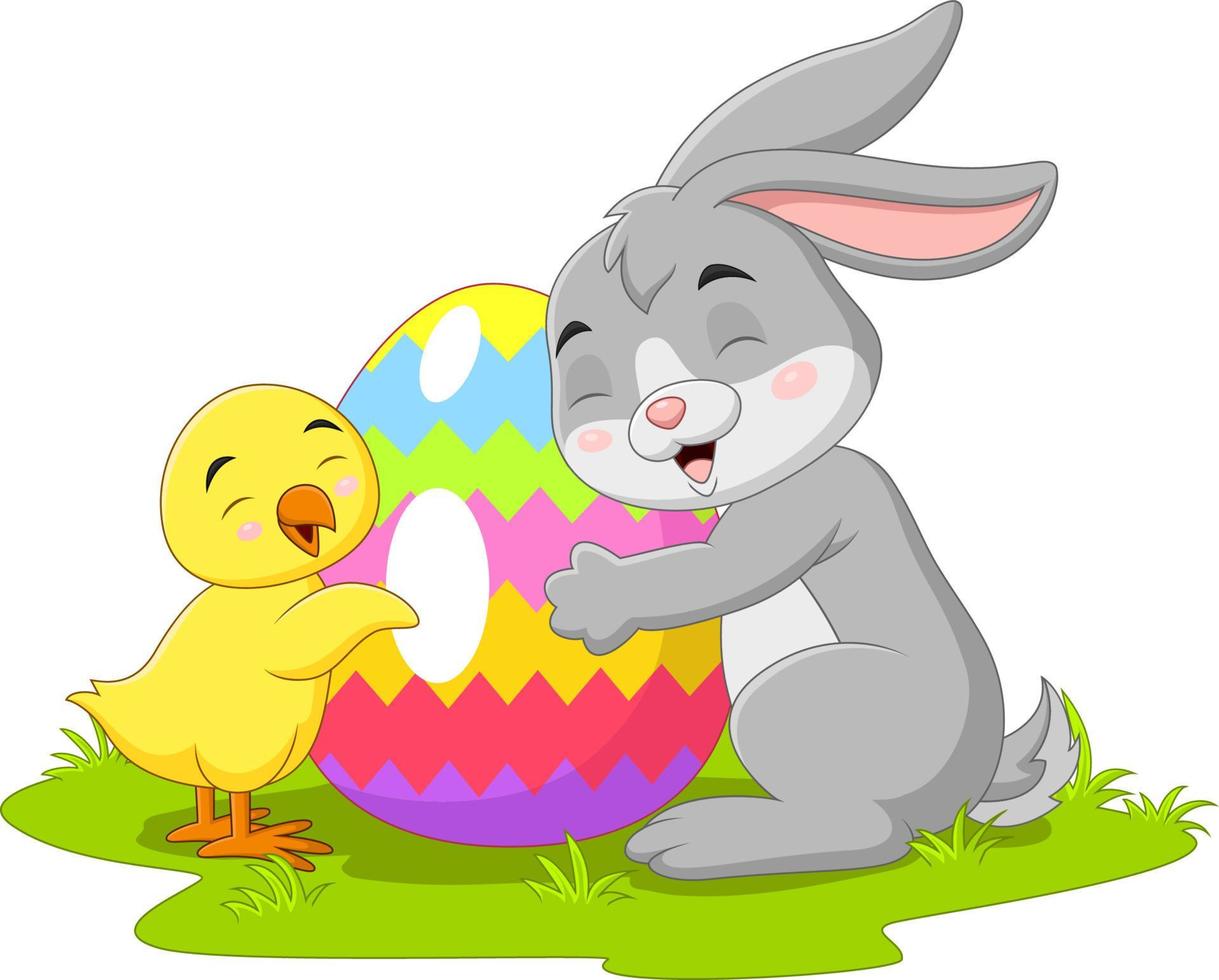 Cartoon little rabbit with chick and easter egg vector