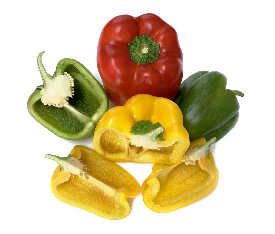 Fresh vegetables Three bell peppers. Three sweet Red, Green, Yellow  Peppers isolated on white background. Half sweet papper. Top view bell peppers. photo