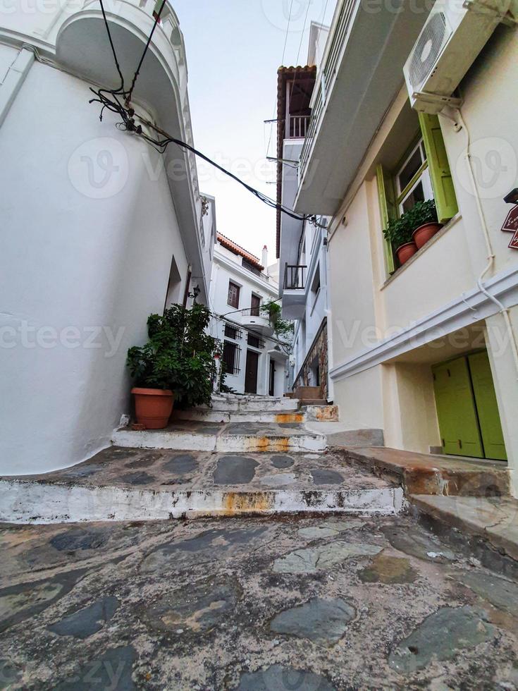 Charming traditional narrow streets of greek islands. Skopelos town on the Skopelos Island, Greece. photo