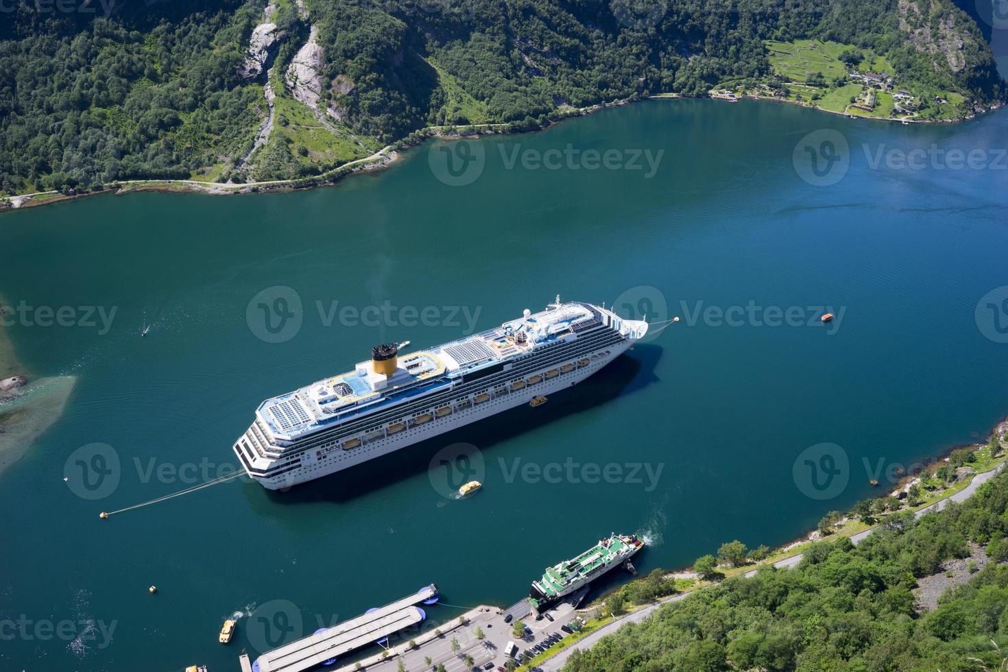 Cruise ship at Geiranger fjord in Norway photo