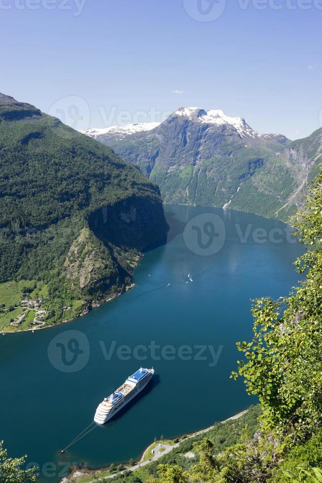 Cruise ship at Geiranger fjord in Norway photo