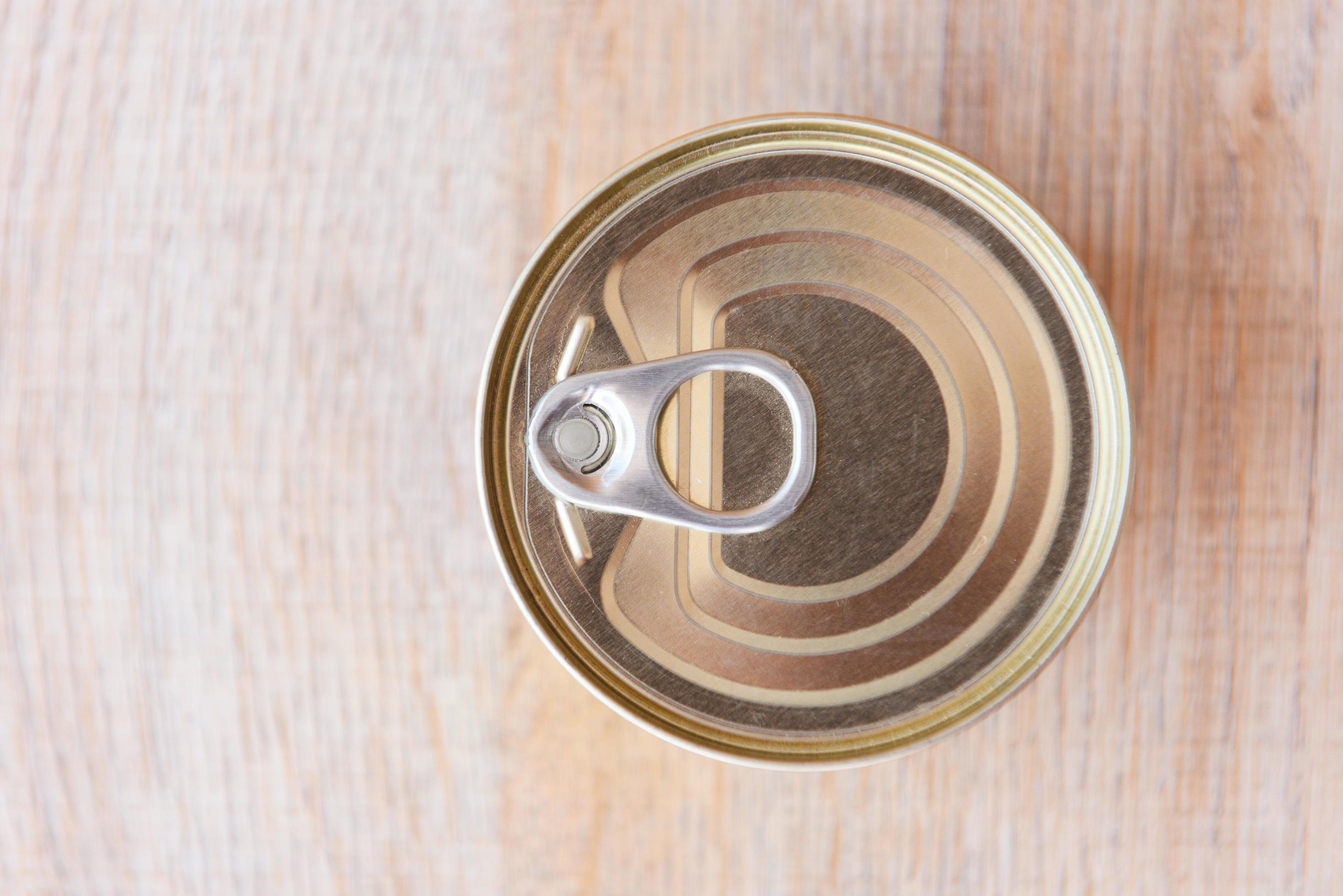 https://static.vecteezy.com/system/resources/previews/005/192/694/large_2x/various-canned-food-in-metal-cans-on-wooden-background-top-view-canned-goods-non-perishable-food-storage-goods-in-kitchen-home-or-for-donations-free-photo.JPG