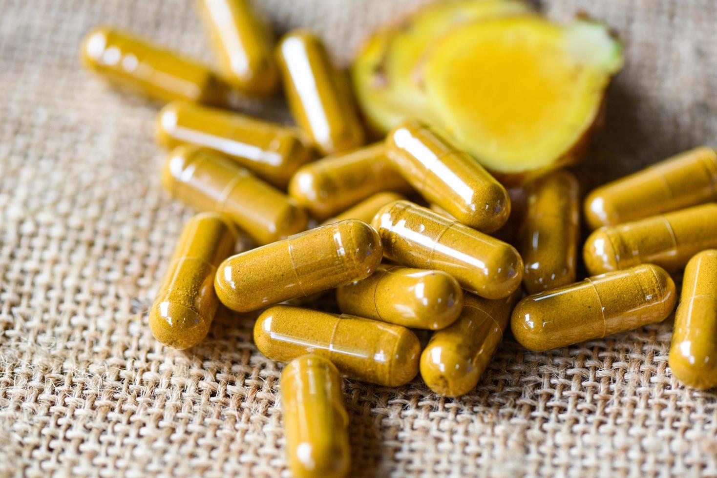 Herbal capsules herb turmeric healthy lifestyle - Herbal medicine extract from nature Non-toxic drug organic product photo