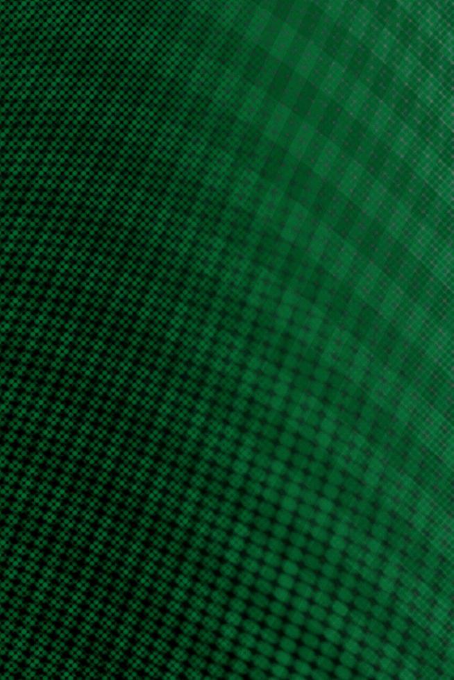Green textured background with light effect dark abstract pattern. photo