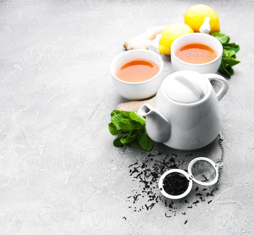 Tea with lemon and mint photo