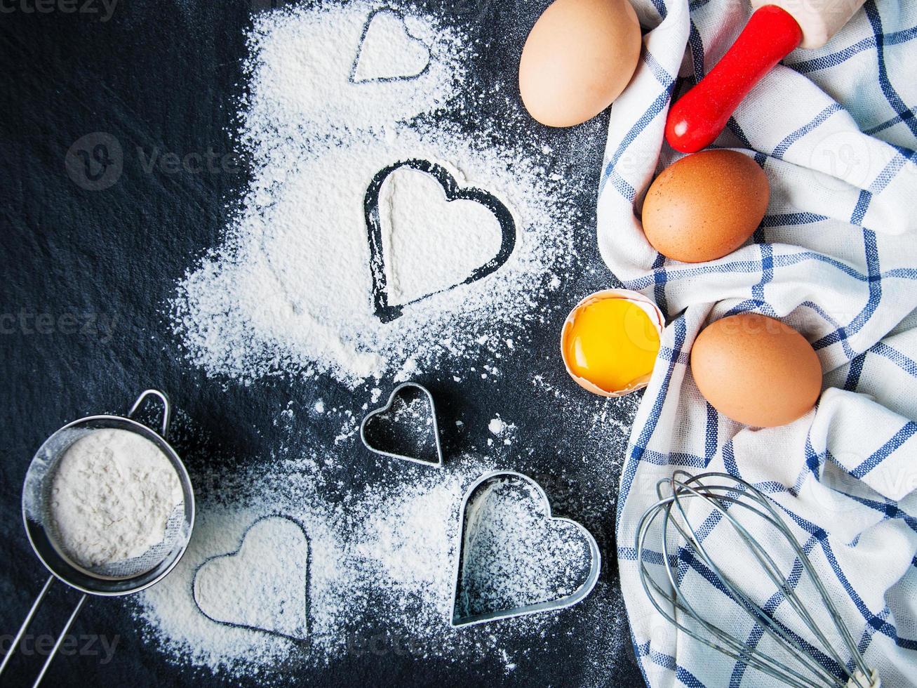 Baking ingredients on a black photo