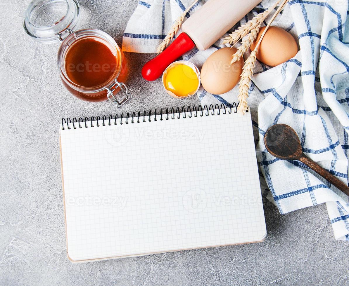 Recipe concept - notebook and ingredients photo