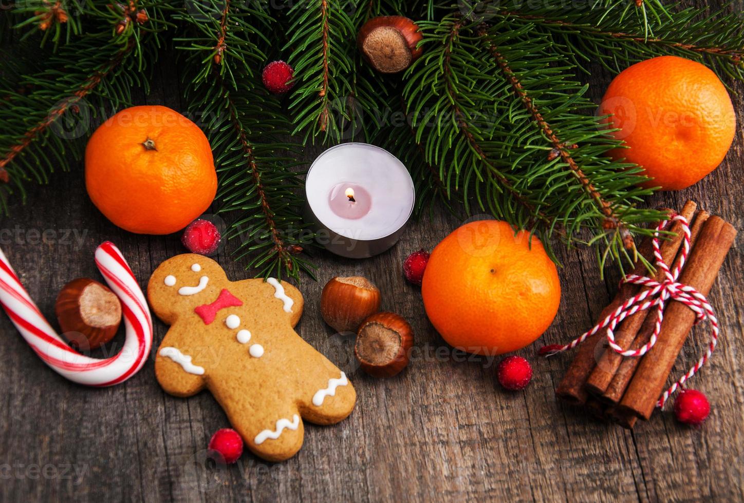 Christmas gingerbread cookie and tangerines photo