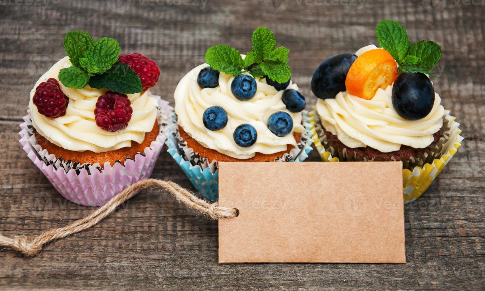 Cupcakes with fresh berries photo