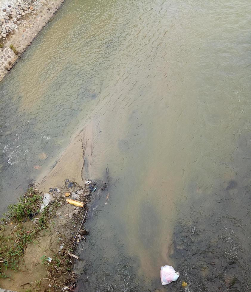 the river water is starting to become shallow due to the drought that hit photo