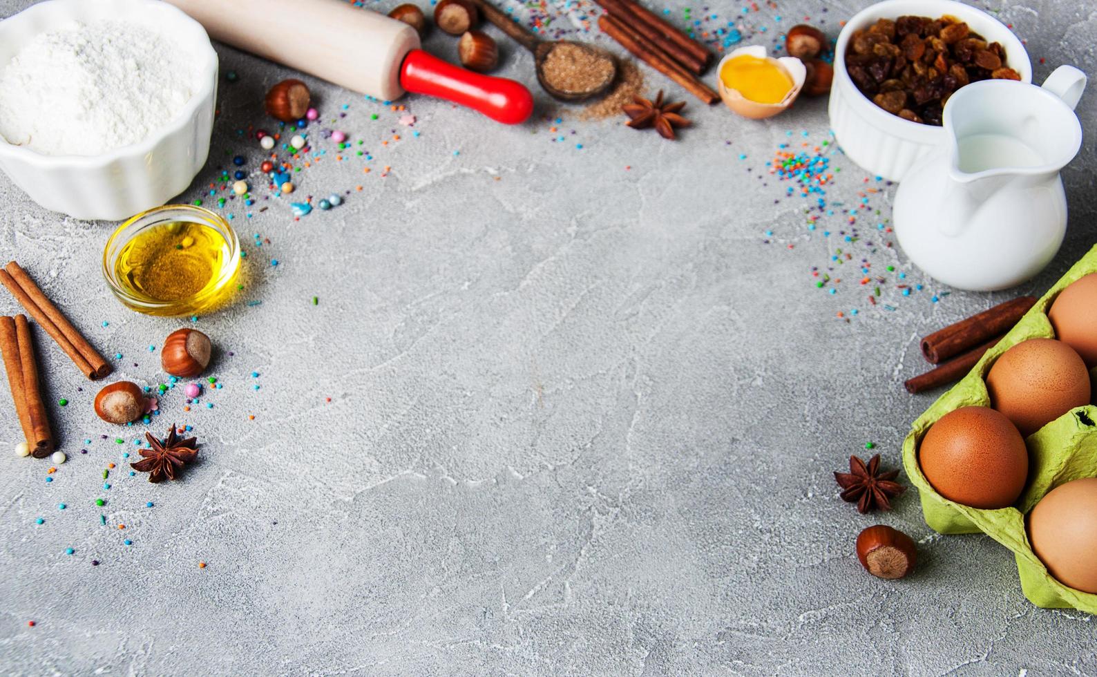 Kitchen table with baking ingredients photo