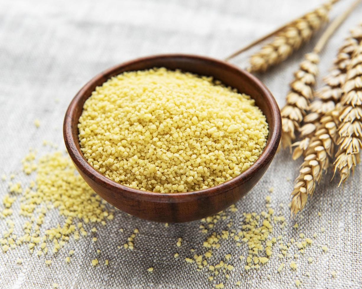 Raw Couscous on a table photo