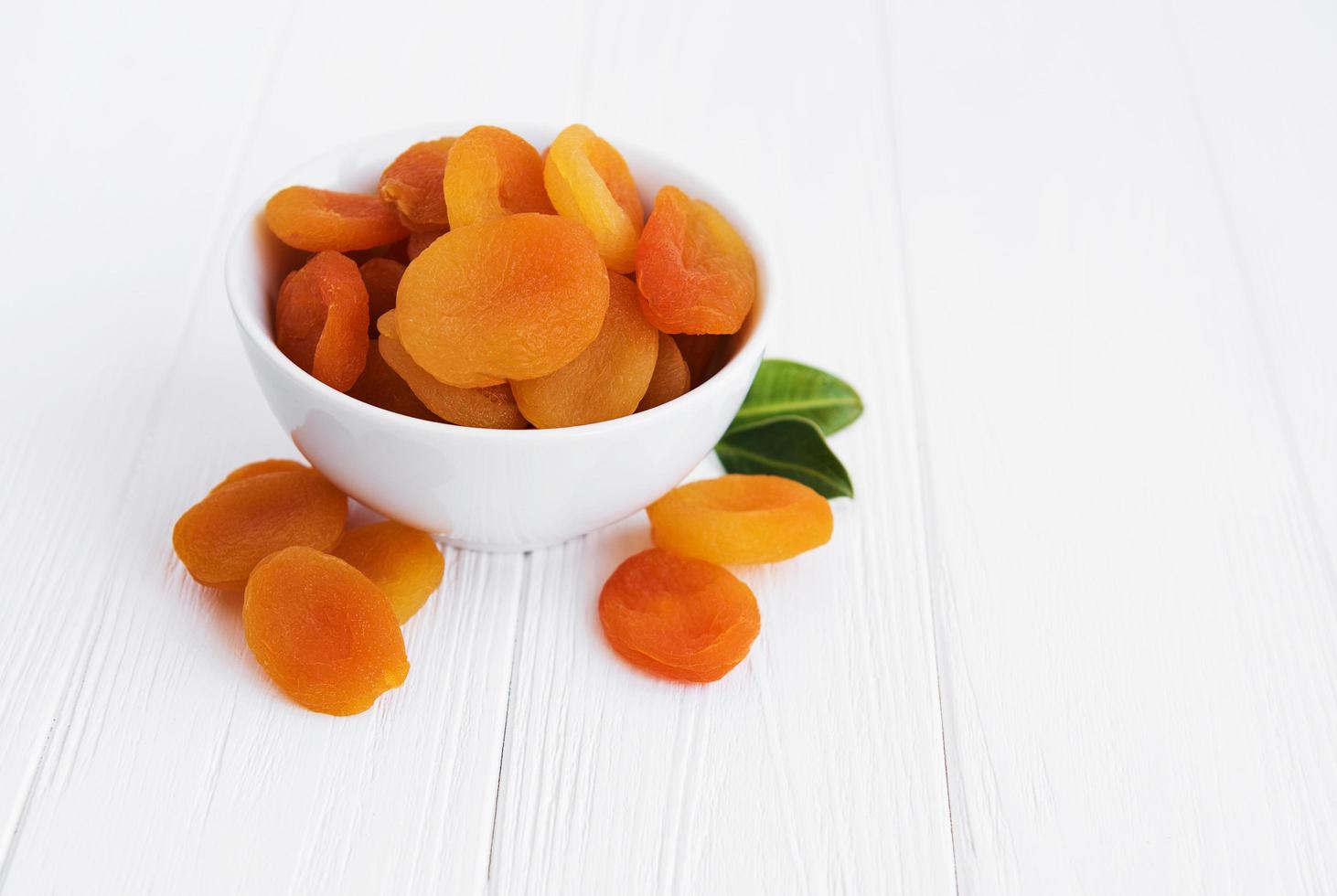 Dried apricots on a table photo