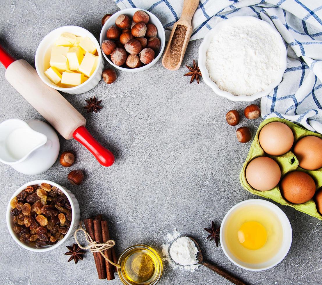 Top view of  kitchen table with baking ingredients photo