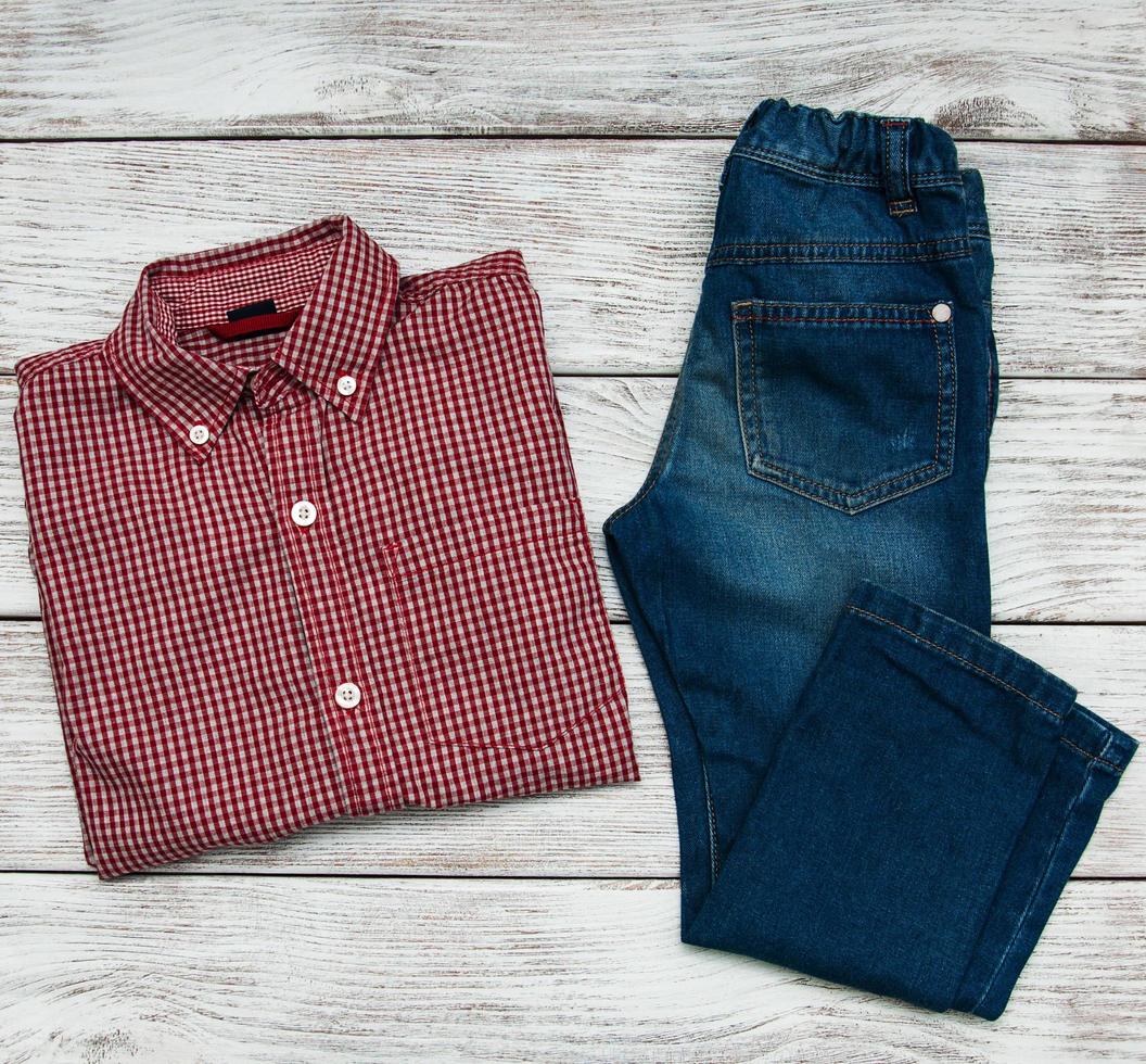 Checkered shirt and jeans photo