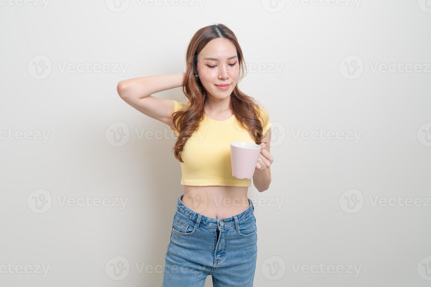 portrait beautiful Asian woman holding coffee cup or mug photo