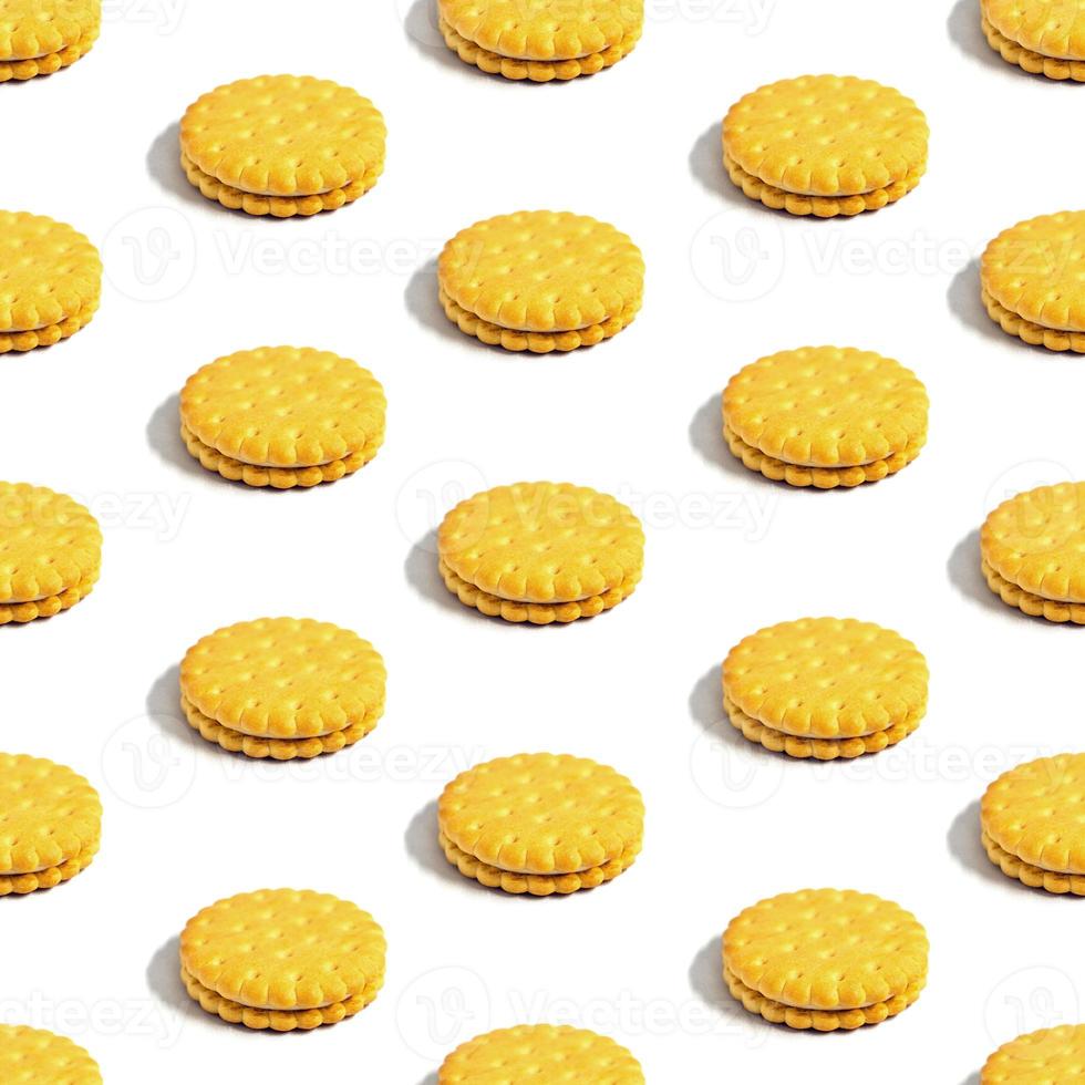 Seamless sandwich cookie pattern with creamy filling on a white background. Confectionery. photo