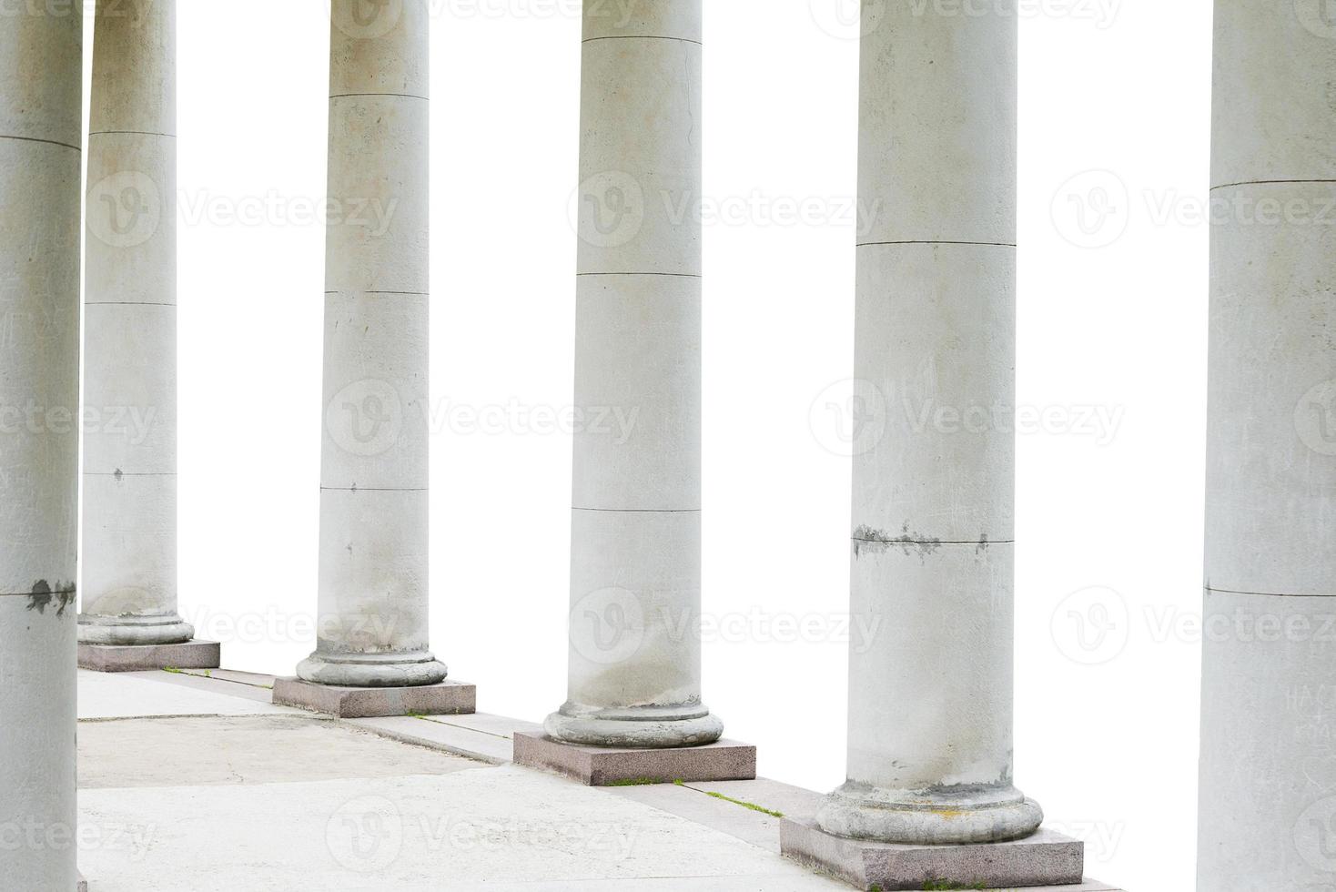 White columns on white isolated background. Historical building. photo