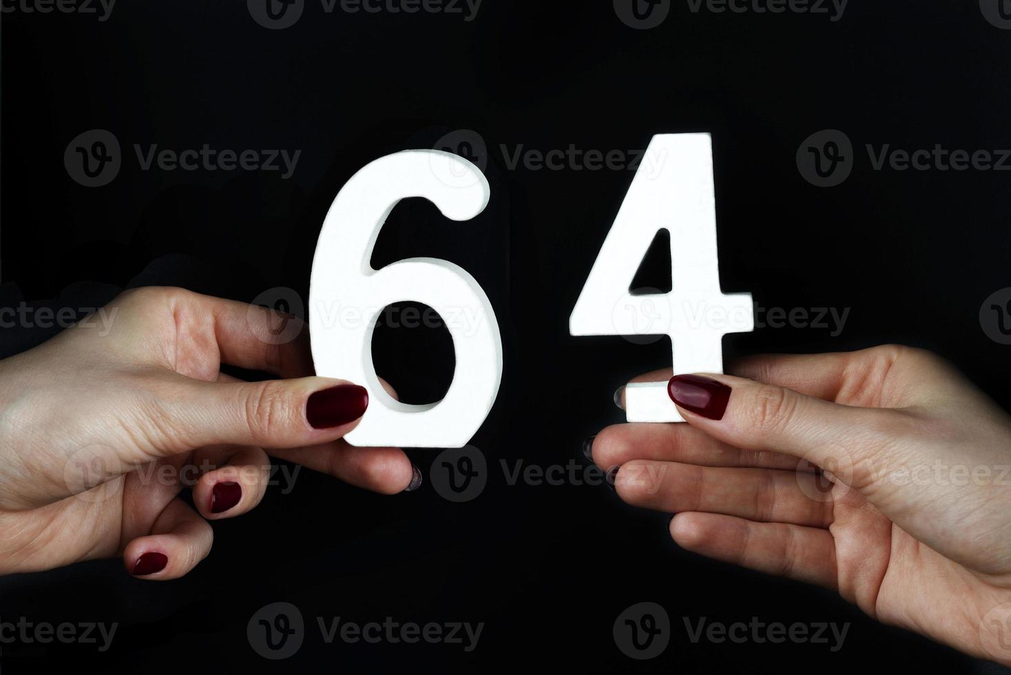 On the female palms figure sixty-four. photo
