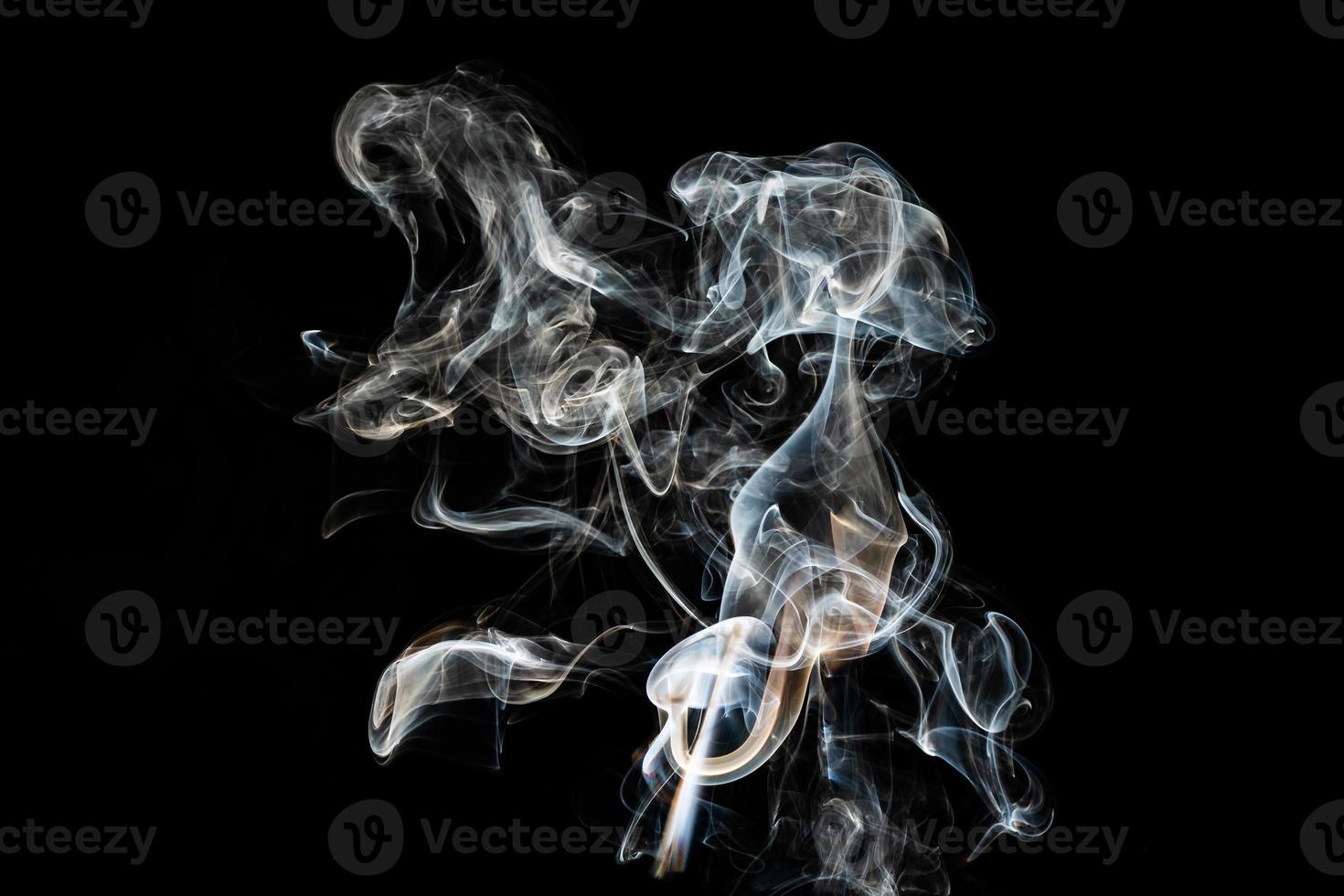 Smoke effect texture. Isolated background. Black and dark backdrop. Smokey fire and mistic effect. photo