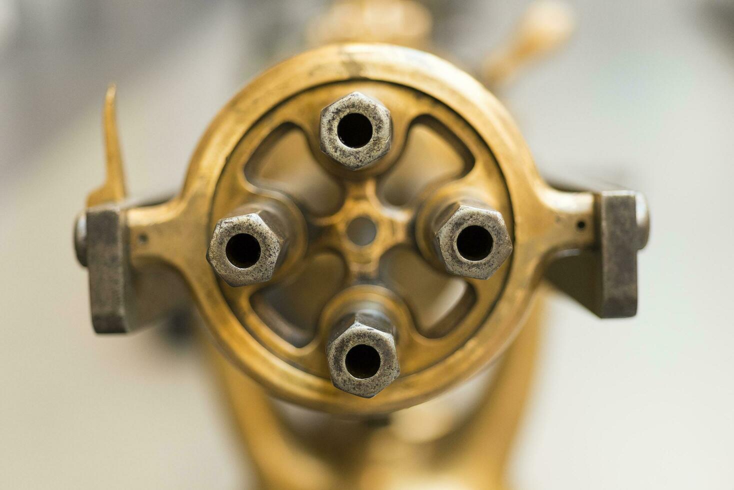 The barrel of a machine gun of four barrels. photo