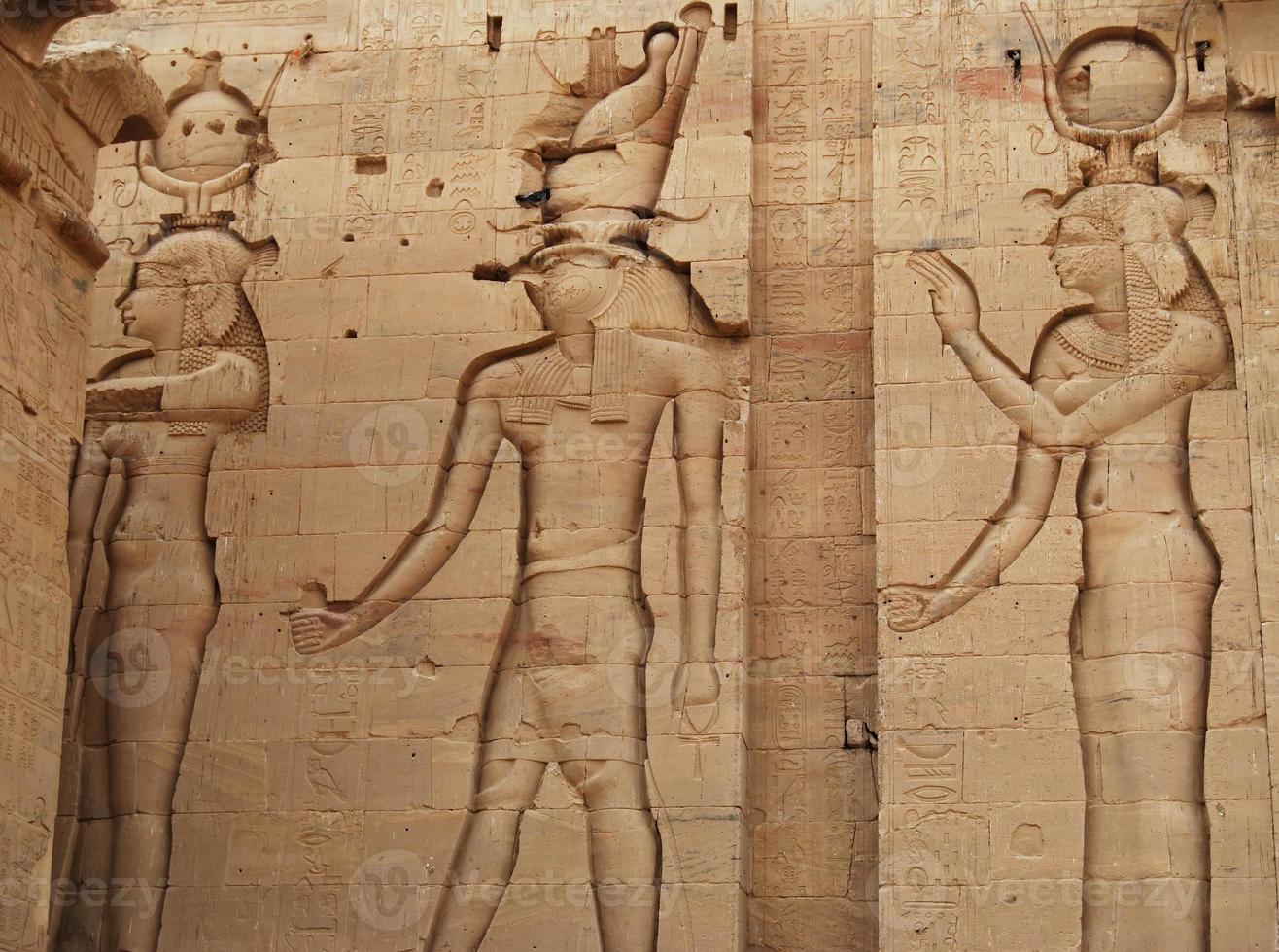 Ancient hieroglyphs at The Temple of Philae. Aswan, Egypt photo