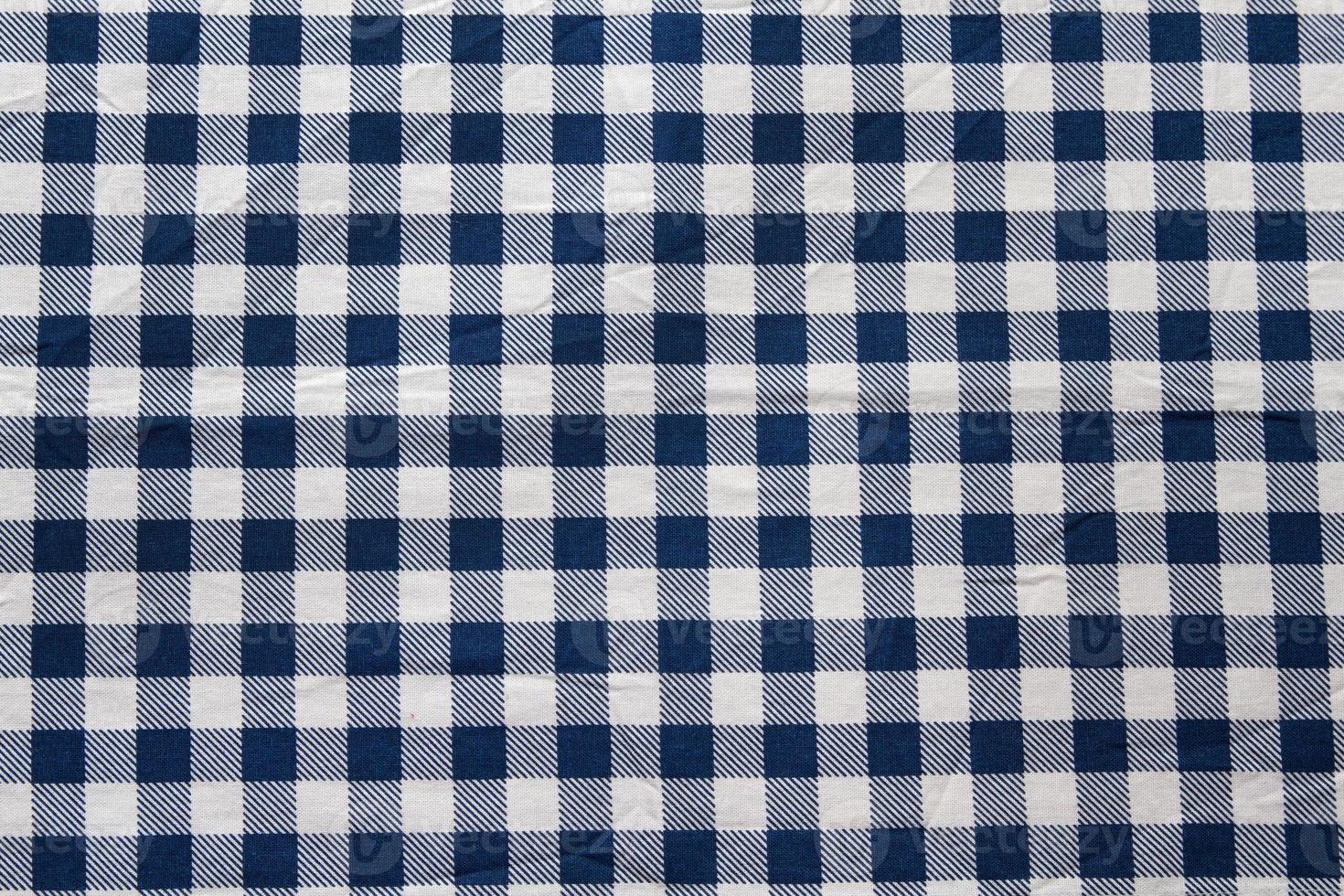 Checkered tablecloth texture top view selective focus photo