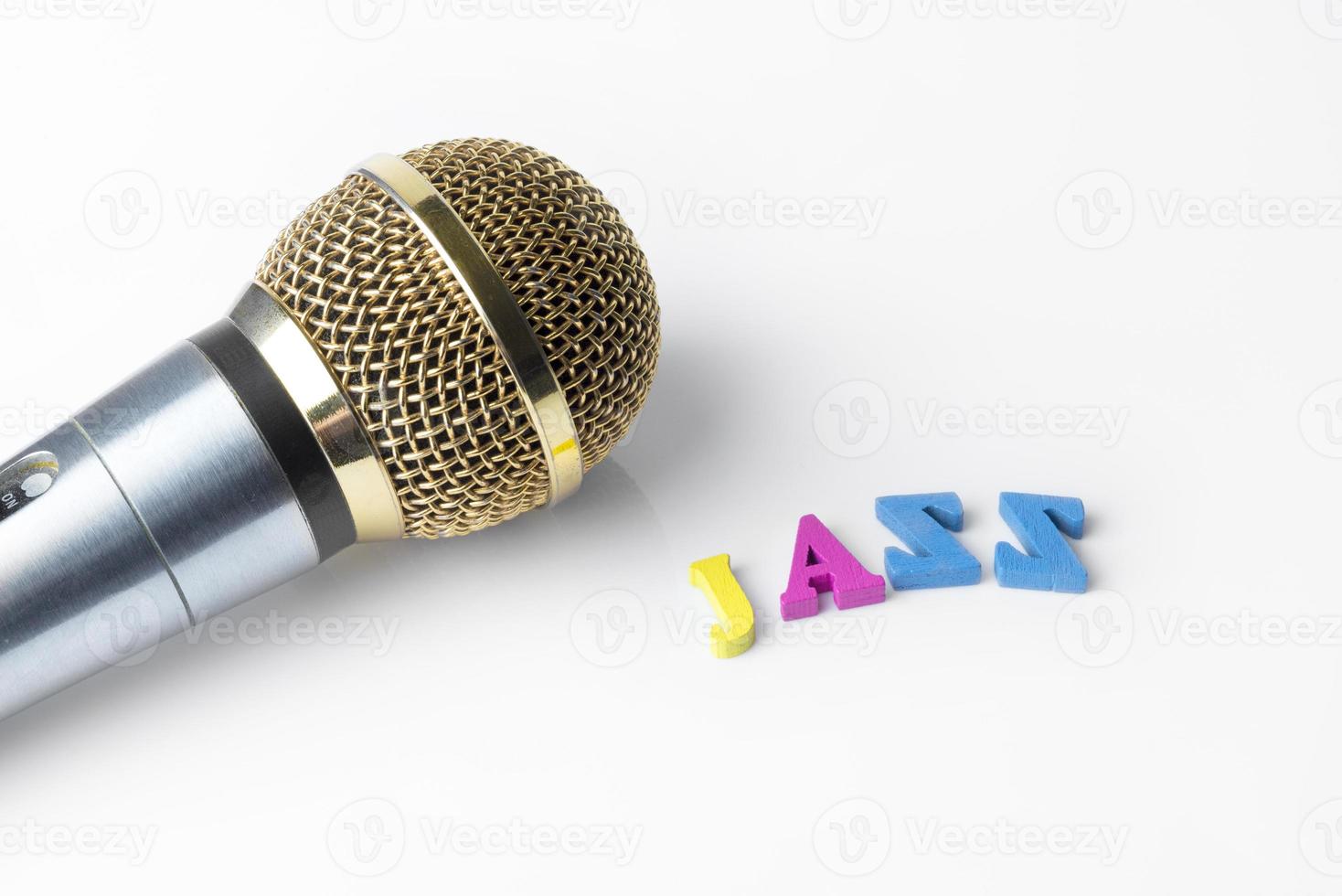 Microphone on a white background, close-up photo