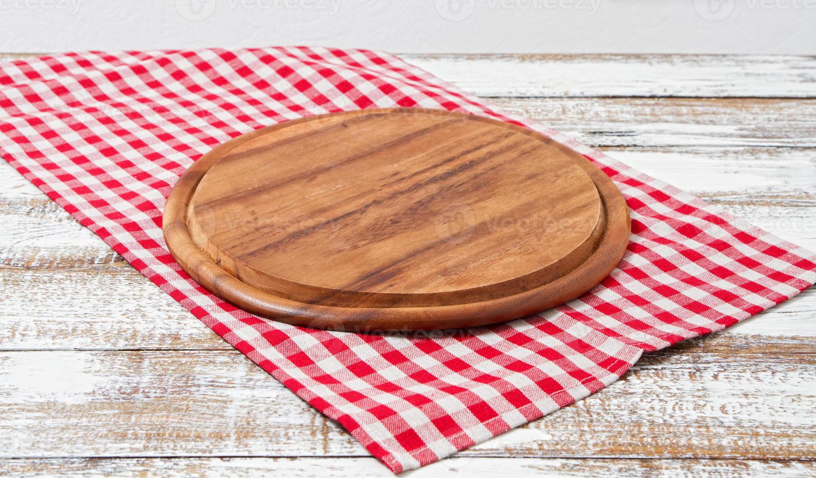 empty cutting desk and tablecloth on wooden table,copy space photo