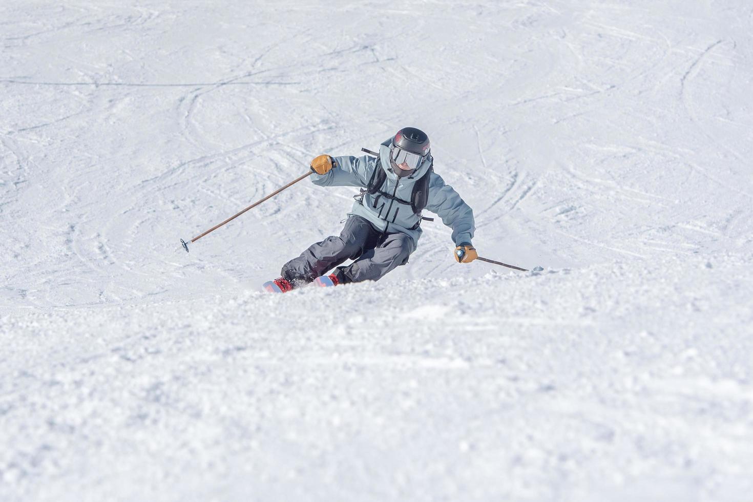 Grandvalira, Andorra . 2021 December 14 . Young skier doing a turn in the Mountains of Andorra in Grandvalira, Andorra. photo