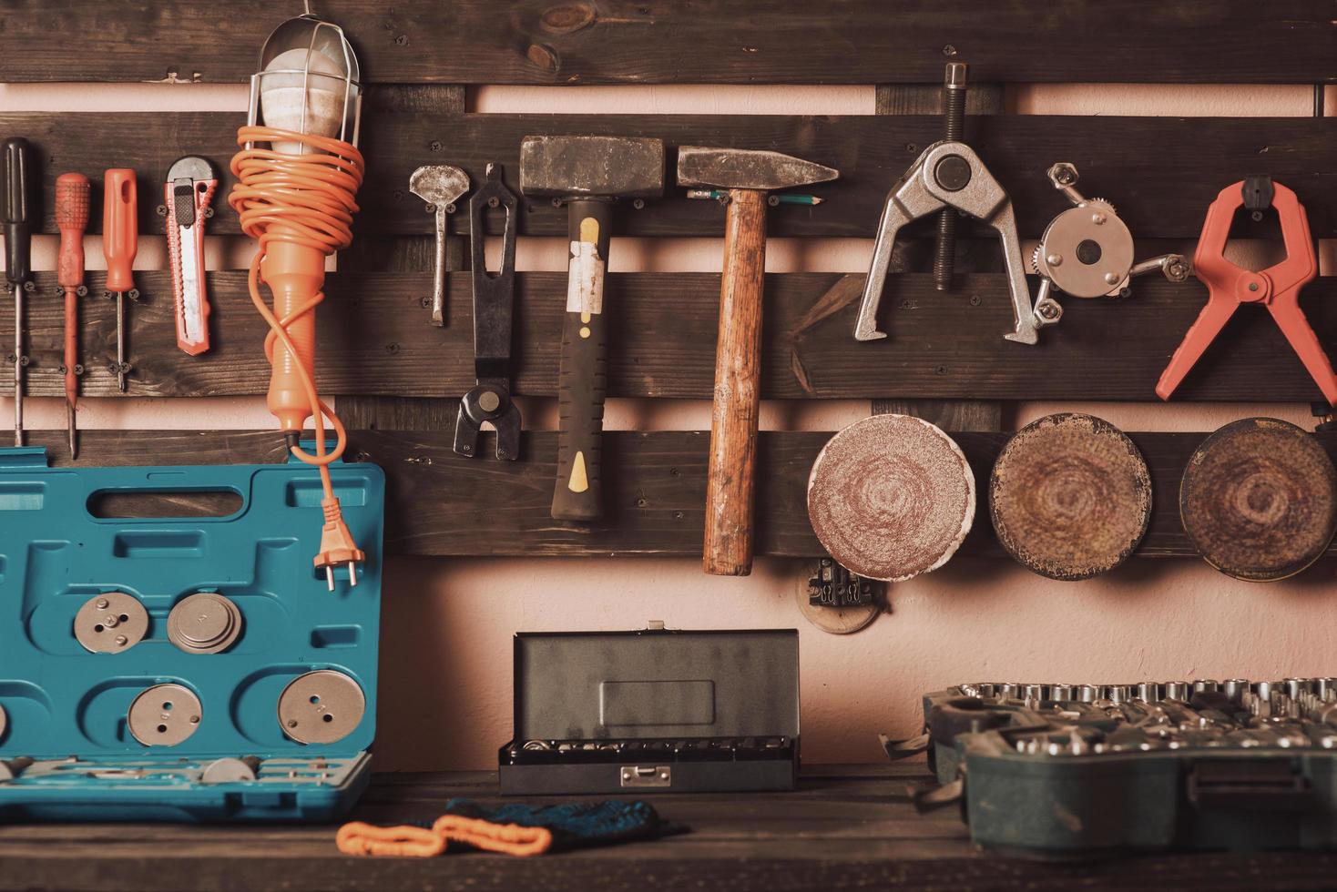 Workshop scene. Tools on the table and board. Garage, car shop. Special vehicle repair tool photo