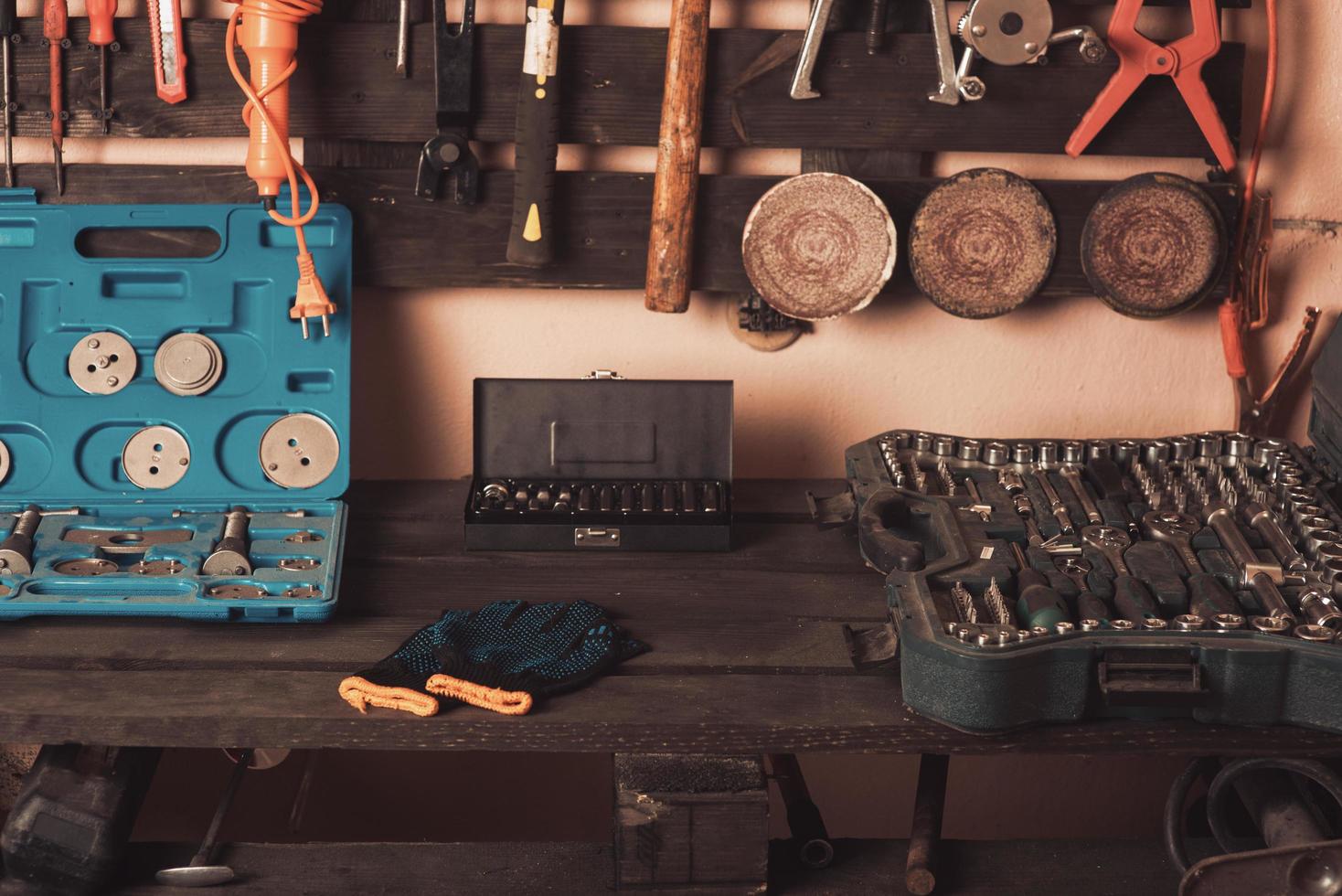 Workshop scene. Tools on the table and board. Garage, car shop. Special vehicle repair tool photo