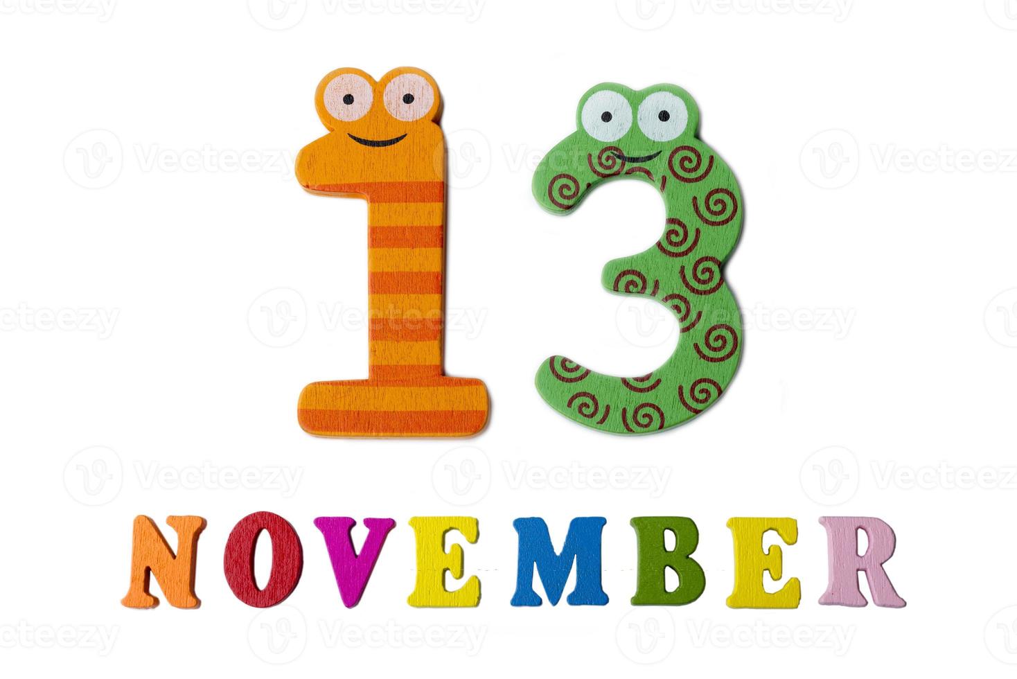 November 13 on white background, numbers and letters. photo