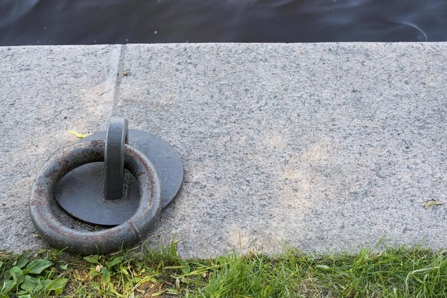 Mooring ring on the pier photo